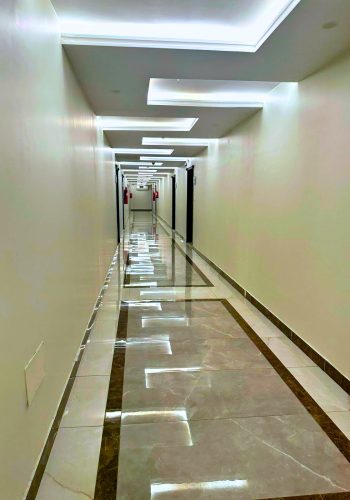 Hotel corridor with ceiling lights, Best Trip Valencia
