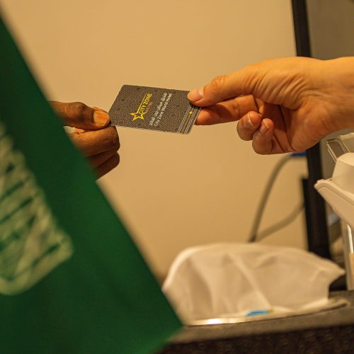 Guest receiving a City Zone key card at reception, Best Trip City Zone